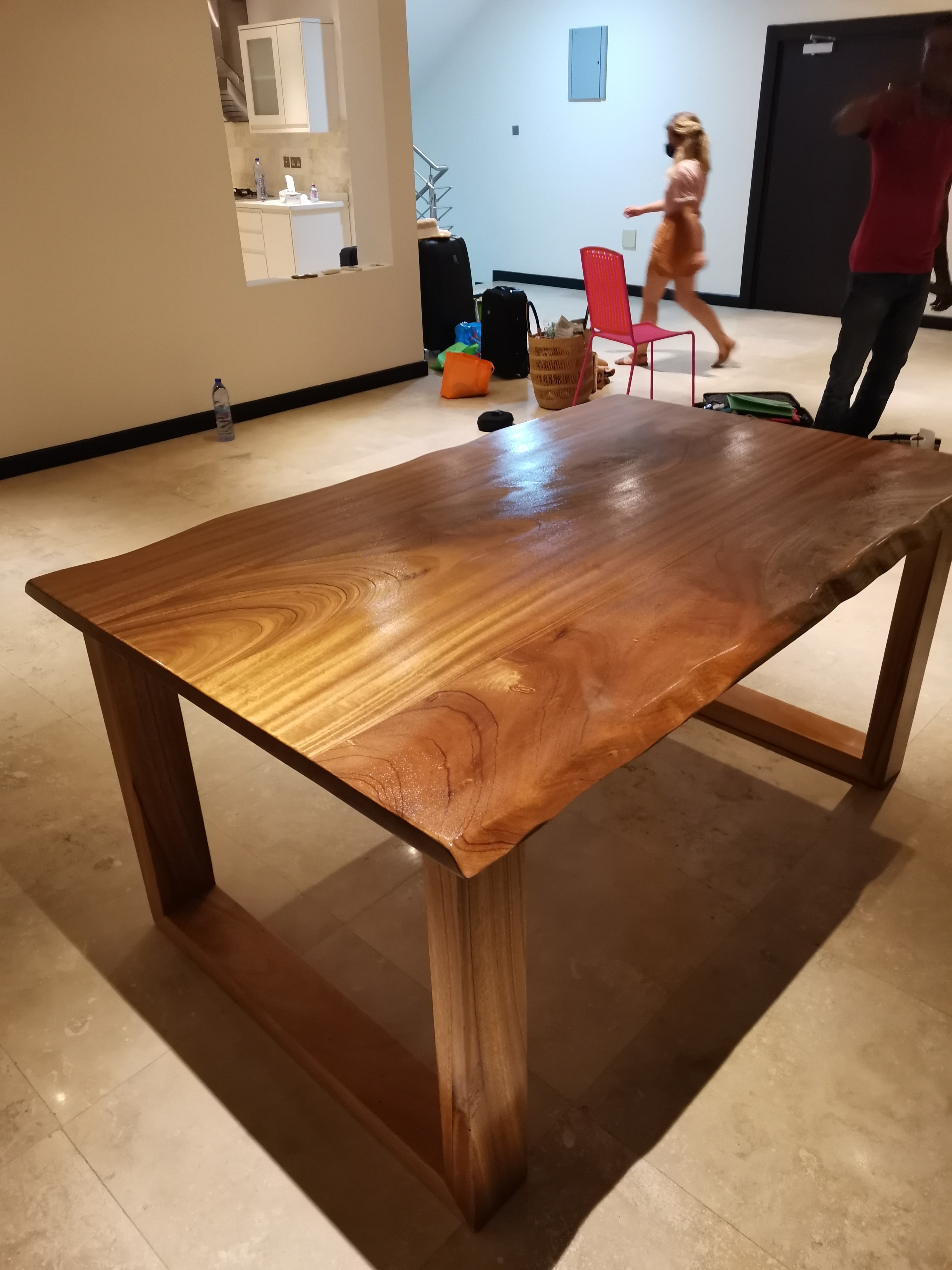 Afromosia dining table installed at the Ridge residence — detail