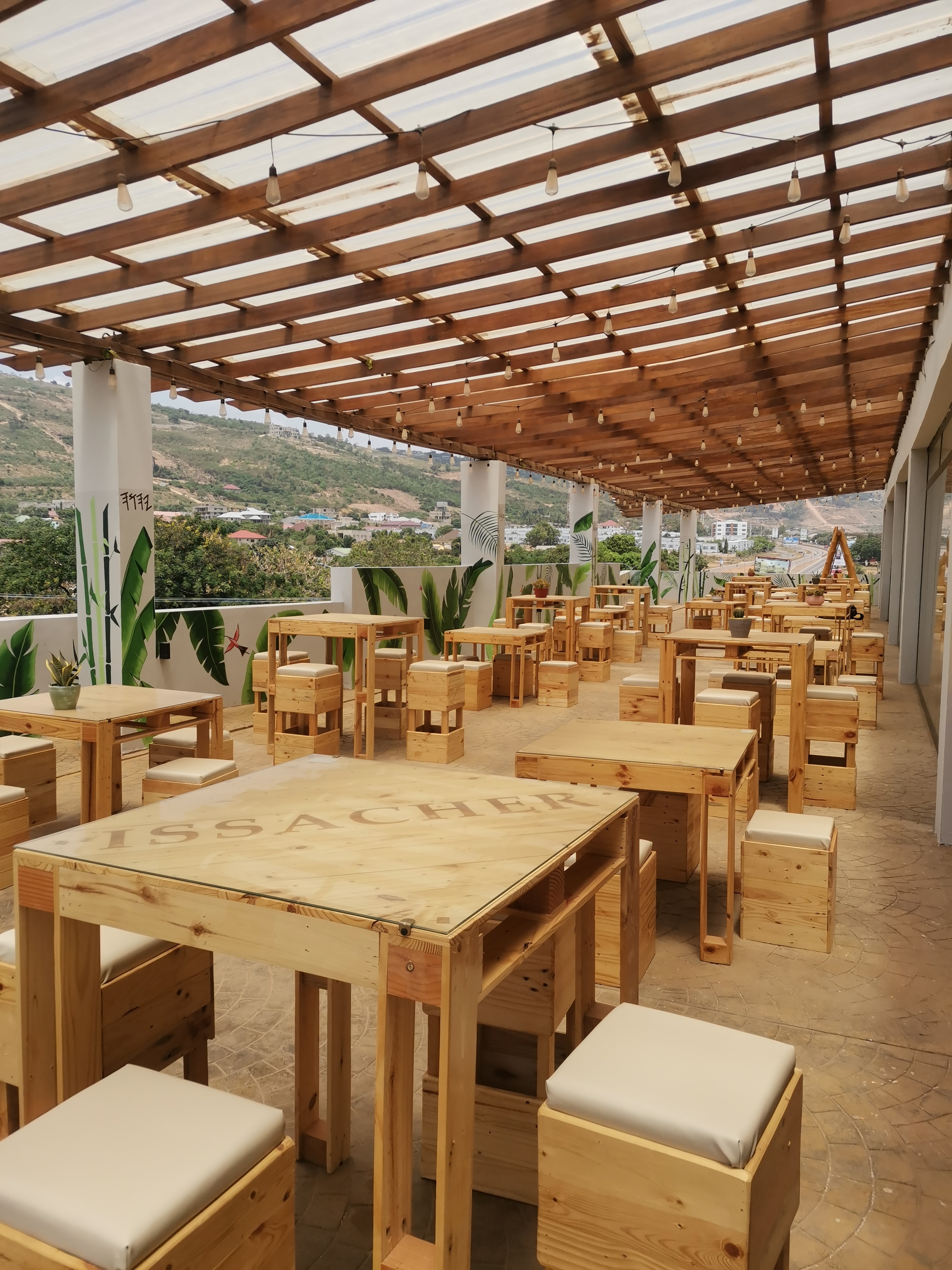Jerksoul rooftop — bar counter and dining area built by Neewoody
