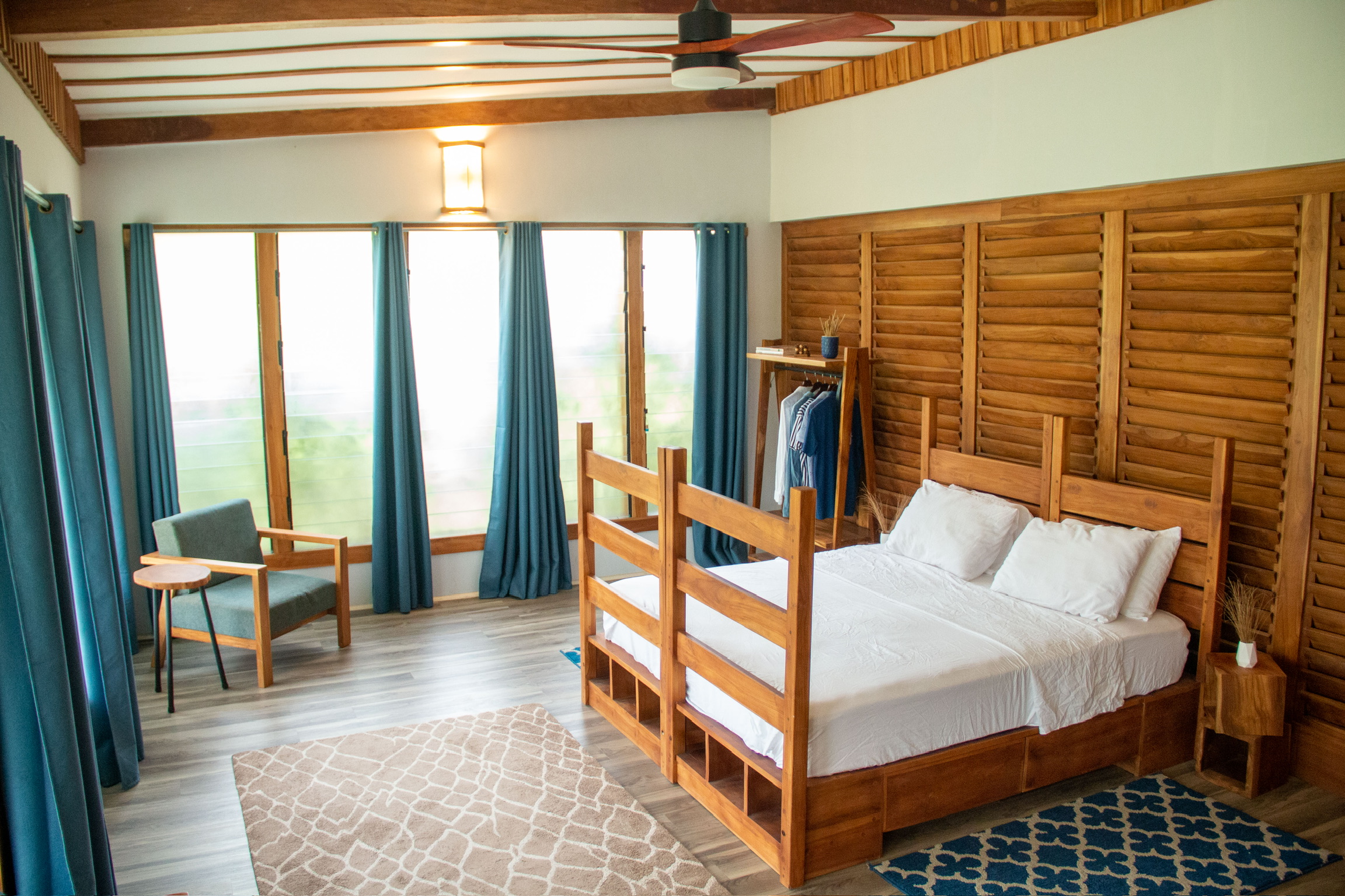 Custom teak beds at Sage Centre retreat, Wli, Volta Region